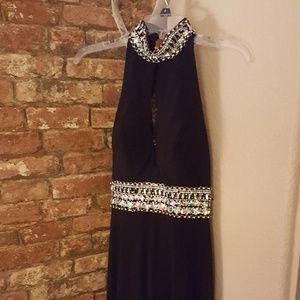 Goegeous Halter beaded Jovani gown.